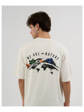 DISCOVERY Men’s We Are Nature Graphic Tee – Off
